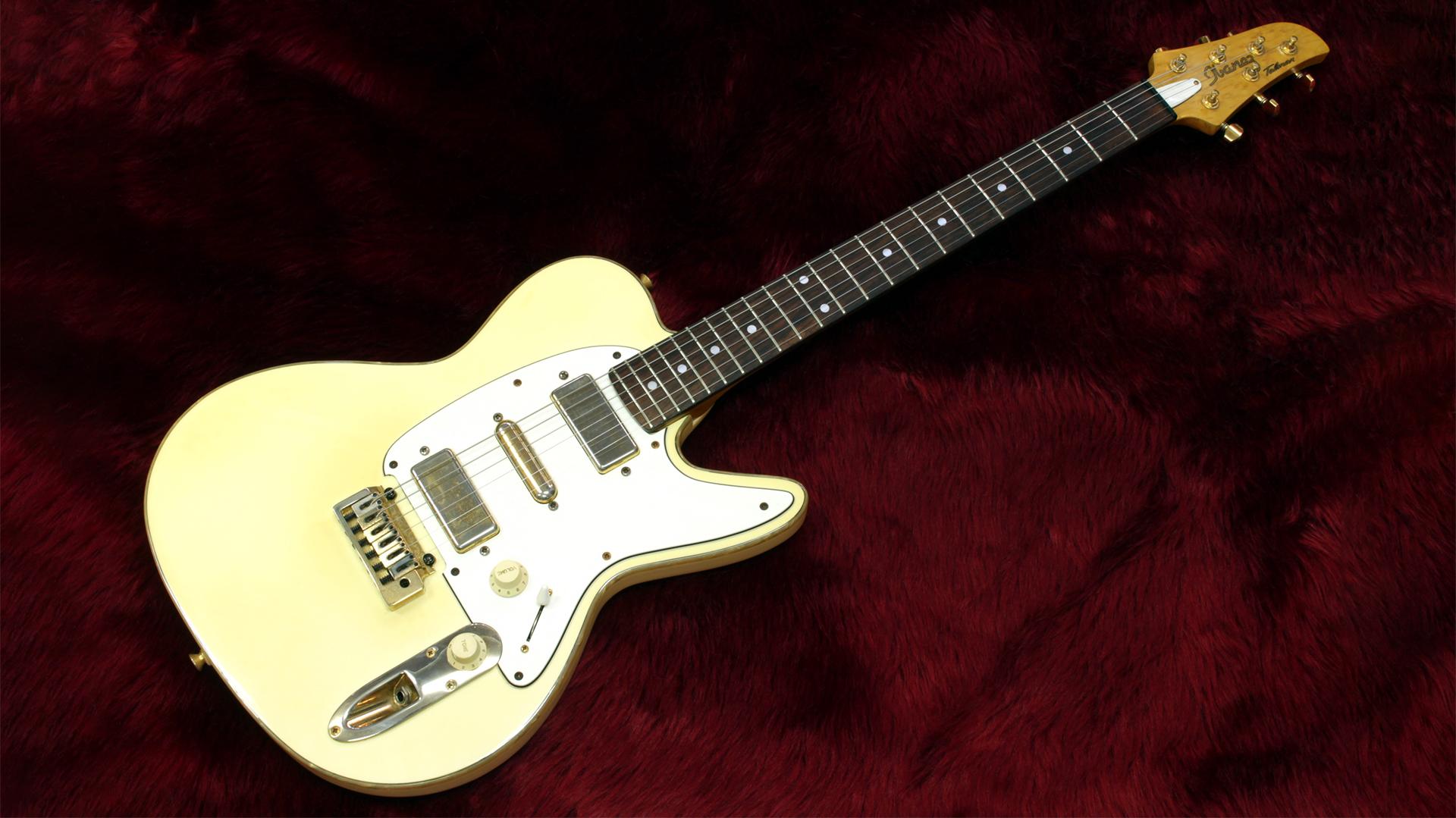 TV650 WH finish guitar showing heavy yellowing