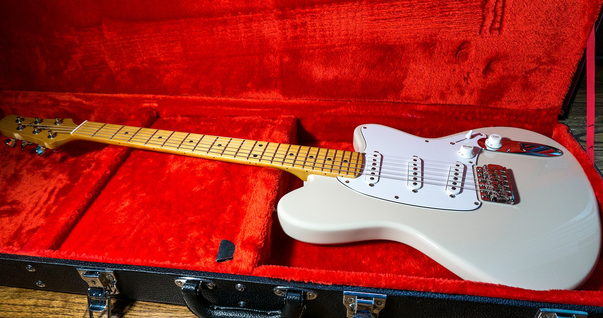 Talman Prestige guitar in a case
