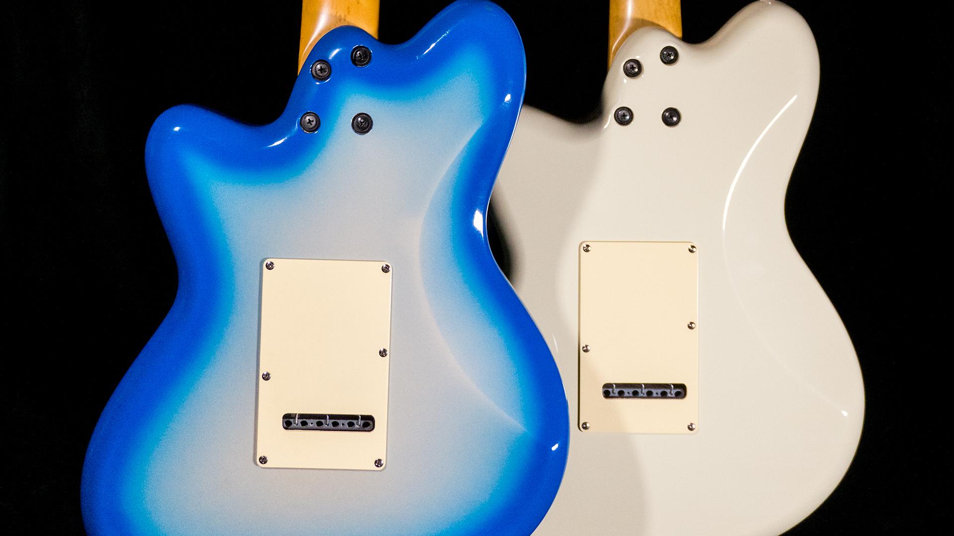 The back side of two TC530 guitars
